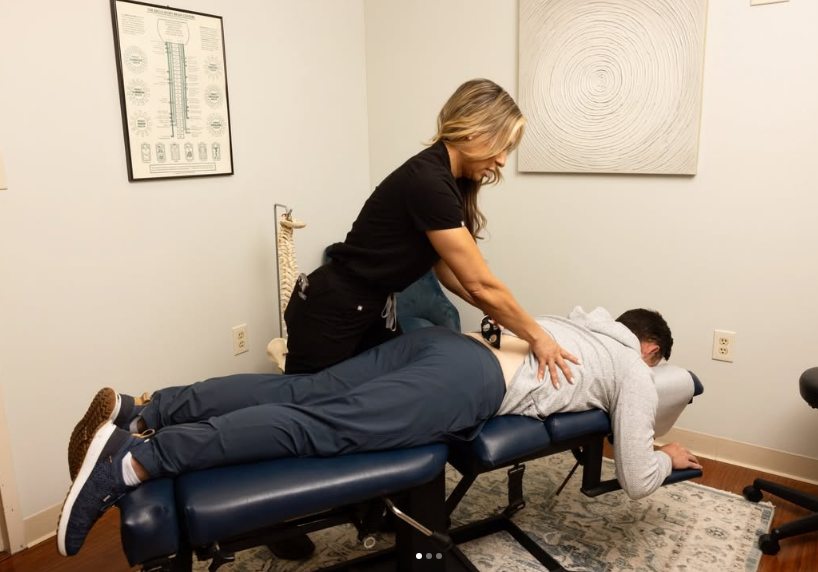 Dr. Nappi providing chiropractic care in a treatment room